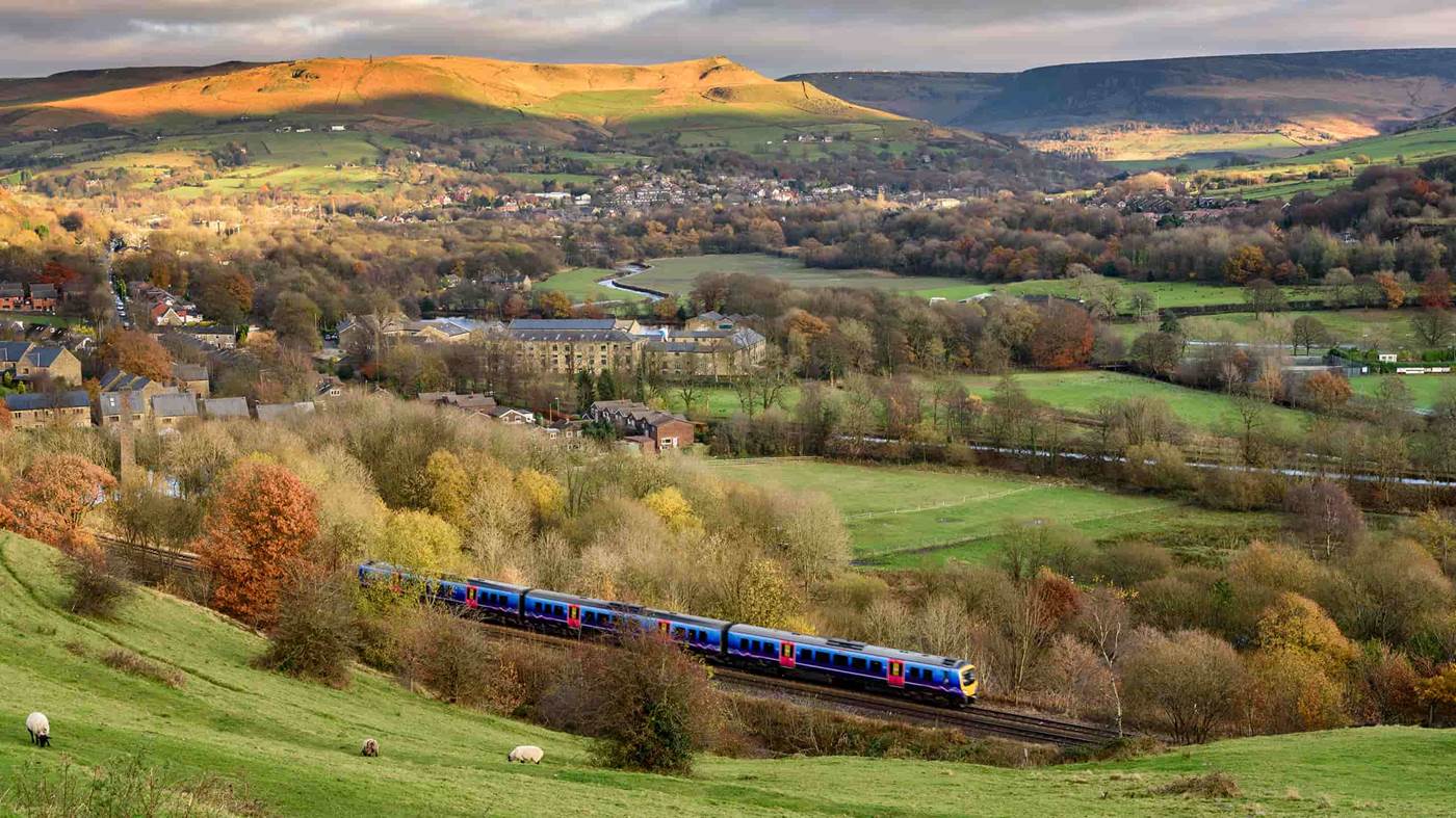 Train travelling through Lancashire countryside 