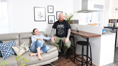 Happy customers posing in their new Laurus home